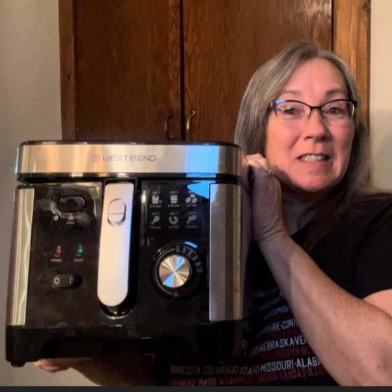 West Bend Deep Fryer on a kitchen counter used for family meals and home cooking.